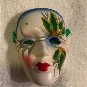 Green and gray Mardi Gras mask